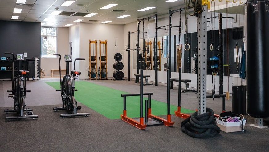 Photo of an empty gym ready for classes to begin.