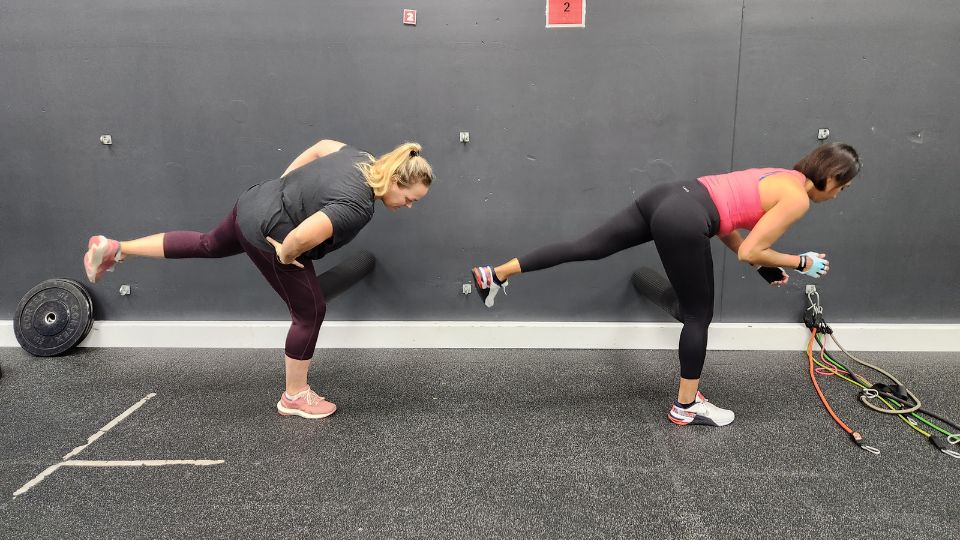 Women Stretching | Featured Image for the Move & Mobility Landing Page for Above and Beyond Fitness Hub